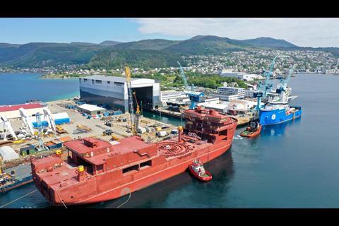 The arrival of the Polish-built hull of Nexans Aurora in Ulsteinvik for equipment and machinery installation and outfitting. (Credit: Nexans).